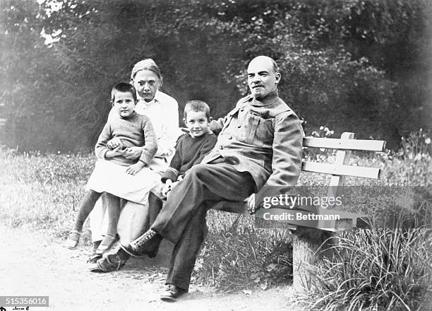 Vladimir Lenin with his wife Nadezhda Krupskaya, with unidentified children . | Location: Near Moscow, USSR.