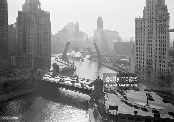 Chicago, Illinois: Jack Knife Bridge. River. The Michigan Avenue Bridge is in the foreground.