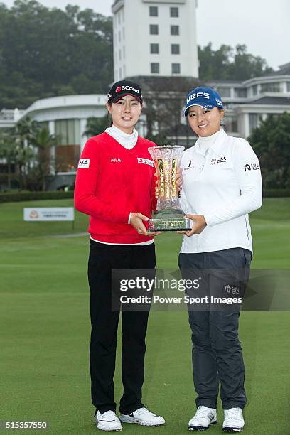 The winning team, Jung Min Lee of South Korea , and Jin Young Ko of South Korea poses with the trophy during the Prize giving ceremony of the World...