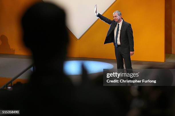 Liberal Democrat leader Tim Farron is applauded after delivering his keynote speech to delgates during the Liberal Democrats spring conference at...