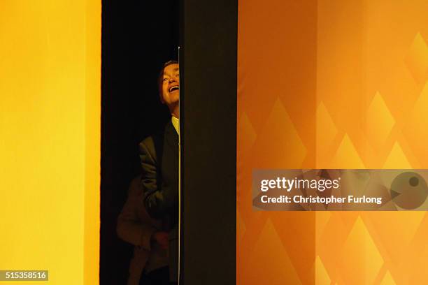 Liberal Democrat leader Tim Farron looks out from backstage as he prepares to deliver his keynote speech to delegates during the Liberal Democrats...