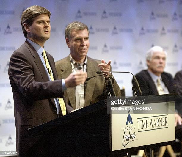 America Online Chairman Steve Case and Time Warner Chairman Gerald Levin announce their merger 10 January 2000, at a New York news conference. The...