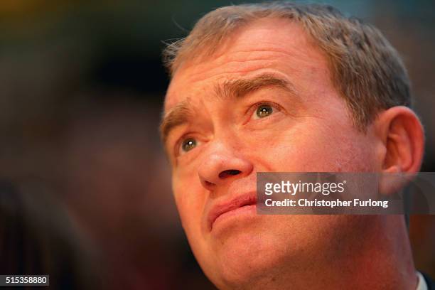Liberal Democrat leader Tim Farron watches a speaker before he delivers his keynote speech to delegates during the Liberal Democrats spring...