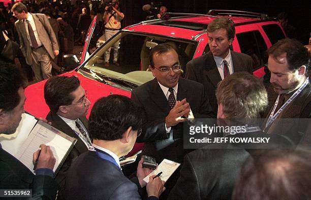 Nissan Chief Operating Officer Carlos Ghosh talks to reporters at the North American International Auto Show in Detroit 11 January 2000. Nissan...
