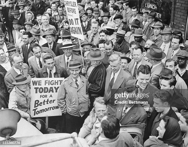 Detroit: Wallace Stumps The Picket Line. Surrounded by striking Chrysler auto workers, third party Presidential candidate Henry A. Wallace, take his...