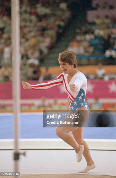 Mary Lou Retton completes her vault routine during the individual events competition in gymnastics at the 1984 Olympics.