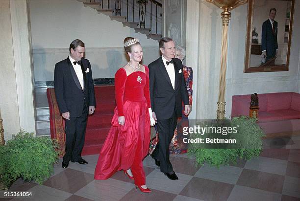 Washington, DC: President George Bush escorts Queen Margrethe of Denmark during a state dinner in her honor at the White House, February 20. February...