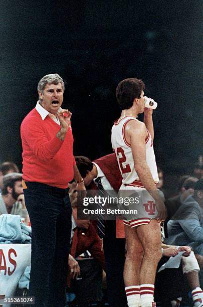 New Orleans: With just a second left in the game coach Bobby Knight flashes the "okay" sign to his leading scorer Steve Alford. Alford scored 23...