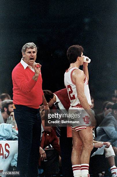 New Orleans: With just a second left in the game coach Bobby Knight flashes the "okay" sign to his leading scorer Steve Alford. Alford scored 23...