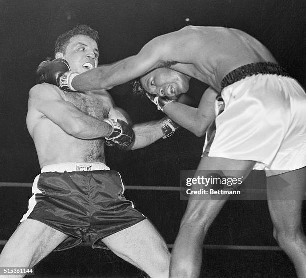 Crown Changes Hands. Chicago: Sugar Ray Robinson stoops to bore in toward Jake LaMotta in the third round of the middleweight championship clash, at...