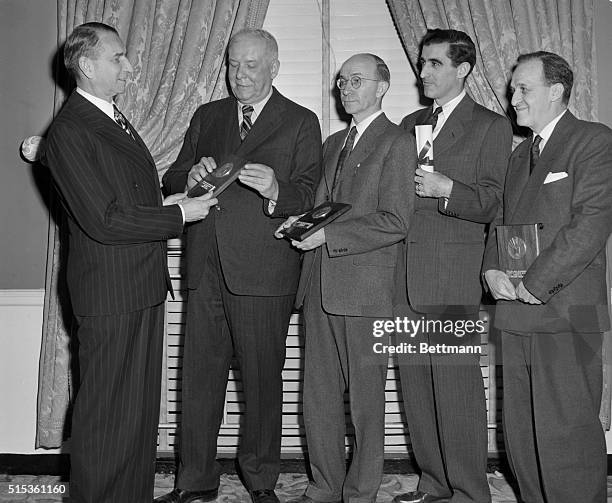 The second annual National Book Awards, for outstanding works by American authors, were made at the Hotel Commodore. Left to right are: Edward A....