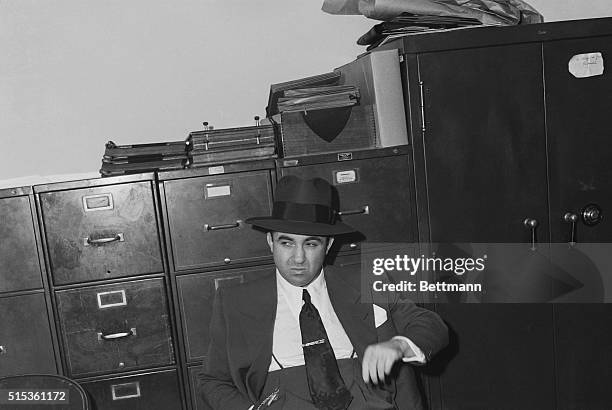 November 19, 1950 - Los Angeles, California: Mobster Mickey Cohen looks a bit bored as he waits to explain his plush income to the Senate crime...