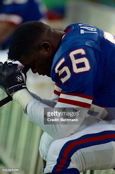 New York Giants' line backer Lawrence Taylor watches the final seconds tick off the clock at the end of the Giants 19-14 loss to the Philadelphians...