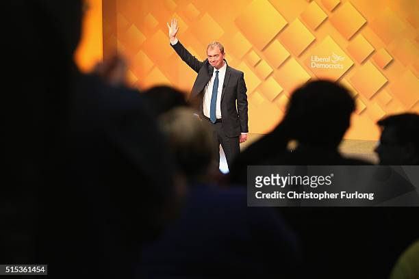 Liberal Democrat leader Tim Farron is applauded after delivering his keynote speech to deelgates during the Liberal Democrats spring conference at...