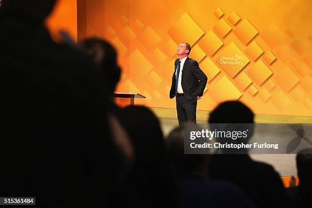 Liberal Democrat leader Tim Farron is applauded after delivering his keynote speech to deelgates during the Liberal Democrats spring conference at...