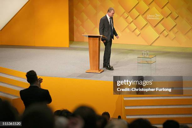 Liberal Democrat leader Tim Farron is applauded after delivering his keynote speech to deelgates during the Liberal Democrats spring conference at...