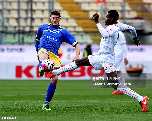 Isaac Cofie of Carpi FC competes for the ball with Mirko Gori of Frosinone Calcio during the Serie A match between Carpi FC and Frosinone Calcio at...