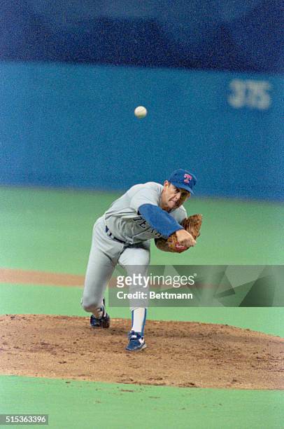 Seattle: Rangers pitcher Nolan Ryan throws to the plate against the Mariners at the Kingdome.