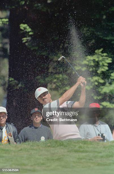 San Francisco: Scott Simpson blasts out of the sand on the 11th hole June 21st. Simpson went on to win the US Open by one stroke.