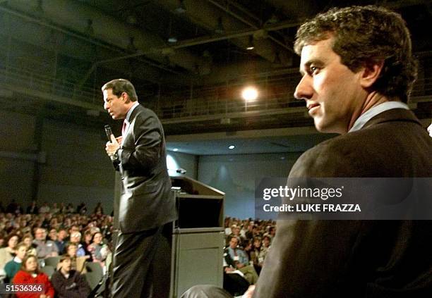 Democratic presidential hopeful US Vice President Al Gore speaks as environmental activist and lawyer Robert Kennedy Jr. Listens during a speech to...