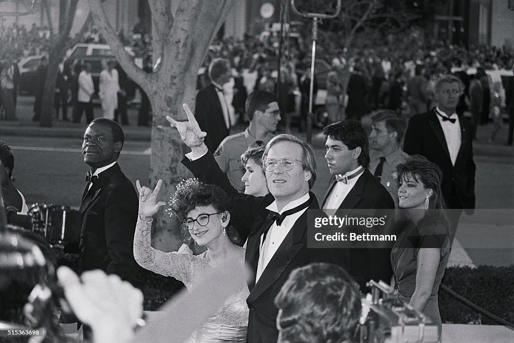 Performers William Hurt and Marlee Matlin Greeting Academy Crowd