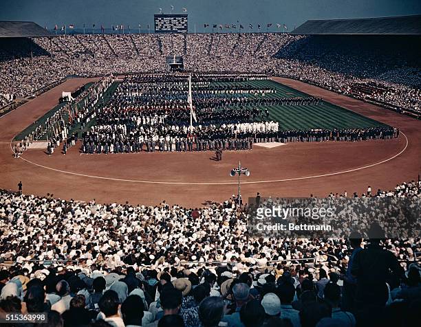 This is a massed general view of the official opening of the XIV Olympiad at Wembly, at the 1948 Summer Games.