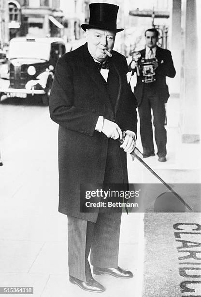 British Prime Minister Winston Churchill arrives at the Claridge Hotel for a farewell dinner with King Frederick and Queen Ingrid of Denmark.