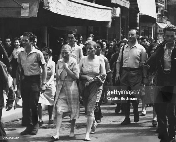 Paris, France: European History-World War II: Women collaborators marched down the streets of Paris by French patriots. They are half naked,...
