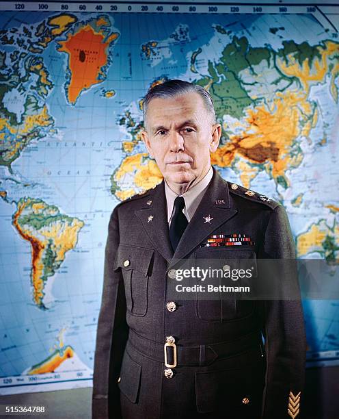 This photo shows Chief of Staff General George C. Marshall at his headquarters in the War Department, located in the Washington office.