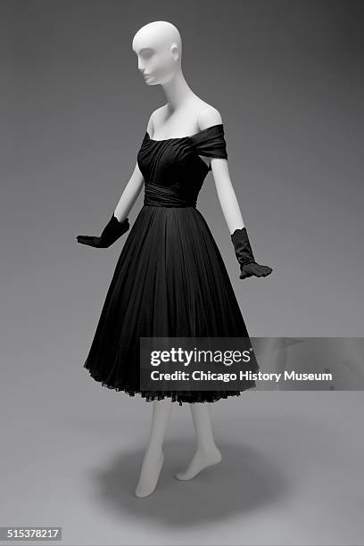 Black chiffon cocktail dress, designed by James Galanos and distributed by Blum's Vogue, Chicago, Illinois, 1958. Shown as part of the Chicago...