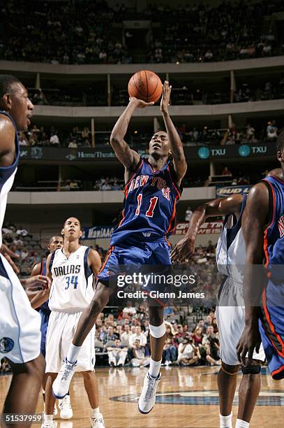 Jamal Crawford of the New York Knicks shoots the ball against the Dallas Mavericks on October 21, 2004 at the American Airlines Center in Dallas,...