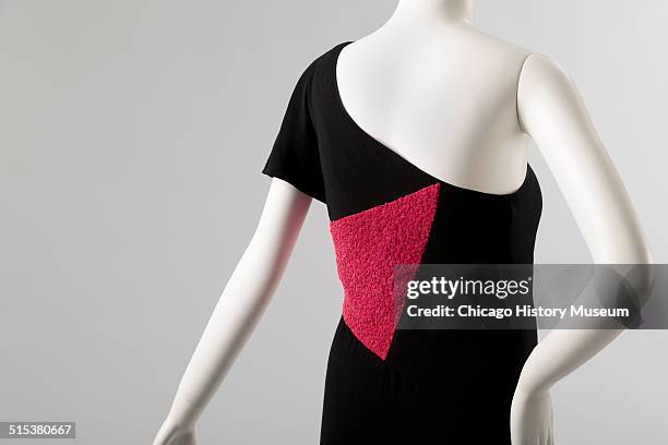 One-shouldered cocktail dress, designed by Karl Lagerfeld for Chloe, with red sequined triangular insets, 1982. Shown as part of the Chicago History...