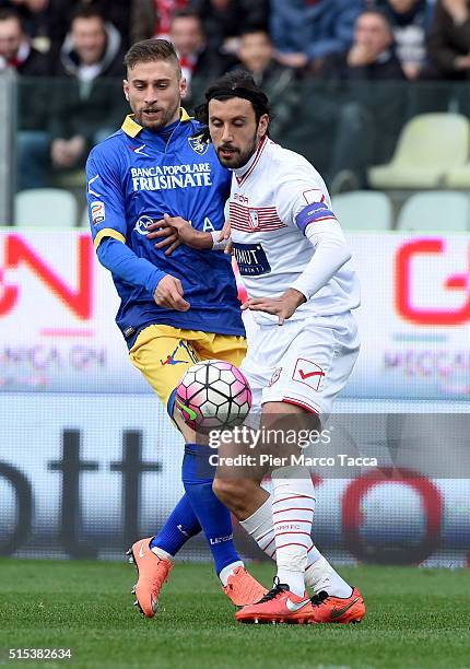 Federico Dionisi of Frosinone calcio competes for the ball with Cristian Zaccardo of Carpi Fc during the Serie A match between Carpi FC and Frosinone...