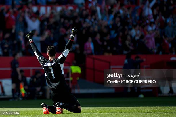 Sevilla's goalkeeper Sergio Rico celebrates his team's goal during the Spanish league football match Sevilla FC vs Villarreal CF at the Ramon Sanchez...