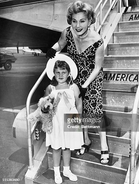 Actress Zsa Zsa Gabor and her daughter Francesca, 5 1/2, are pictured at LaGuardia Airport on arrival from Los Angeles via American Airlines. Miss...