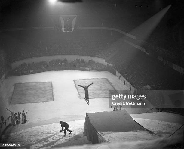 Casey Jones, Professional Champion of Salisbury, CT, is pictured as he soared off the incline during the first round of the Professional Ski Jumpers'...