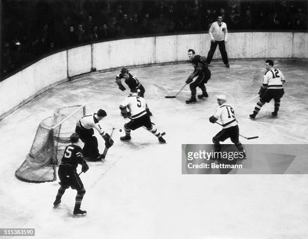 Here is a flash of action in the fifth and deciding game of the Stanley Cup series in Boston Garden last night, when the Boston Bruins vanquished the...