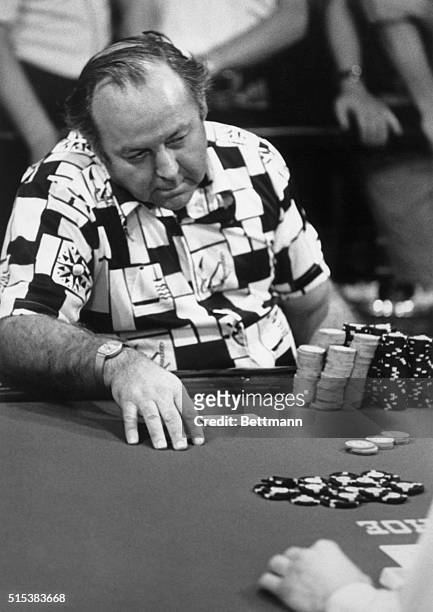 Brian "Sailor" Roberts, mentally ponders the hand of an opponent in the final minutes of the World Series of Poker at Binion's Horseshoe Casino in...