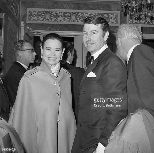 Gloria Vanderbilt and her husband Wyatt Cooper arrive at the Ethel Barrymore Theatre to attend the premier of the Broadway play ‘The Seven Descents...