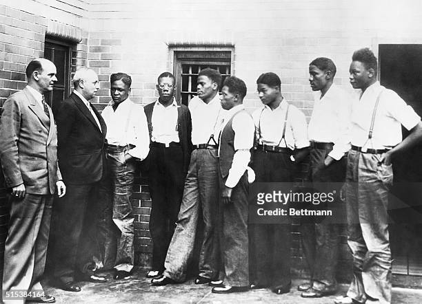 The Scottsboro Case Defendants are shown with one of their attorneys, Samuel Leibowitz of New York , at a Jefferson, Alabama, jail.