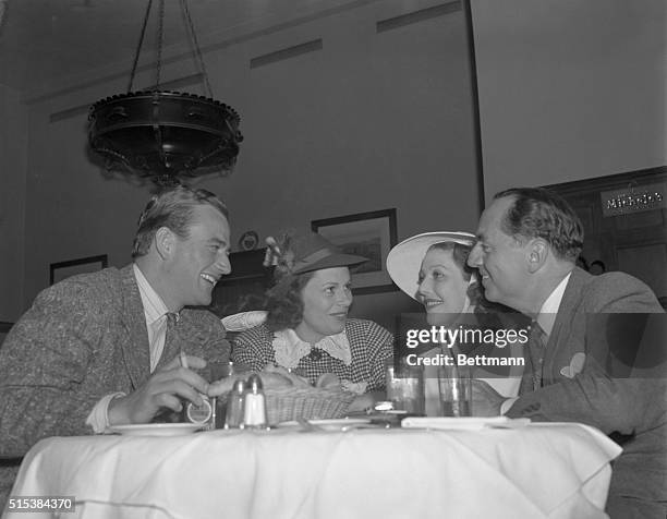 Mr. And Mrs. John Wayne, Loretta Young and William Powell, who is recuperating from a lengthy illness , shown at the Beverly Hills Brown Derby,...