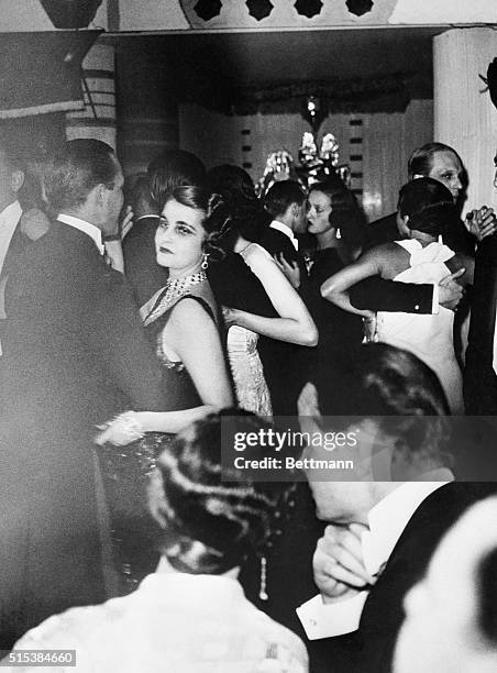 Princess Alexis Mdivani, the former Barbara Hutton, heiress to the Woolworth Millions, dancing with one of her guests at a party celebrating her...