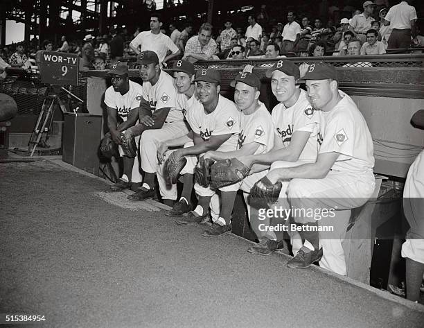 Seven of the Brooklyn Dodgers who were picked for the All Star team are shown here. Left to right is Jackie Robinson, Don Newcombe, Preacher Roe, Roy...