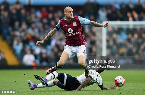 Alan Hutton of Aston Villa battles with Danny Rose of Tottenham Hotspur during the Barclays Premier League match between Aston Villa and Tottenham...