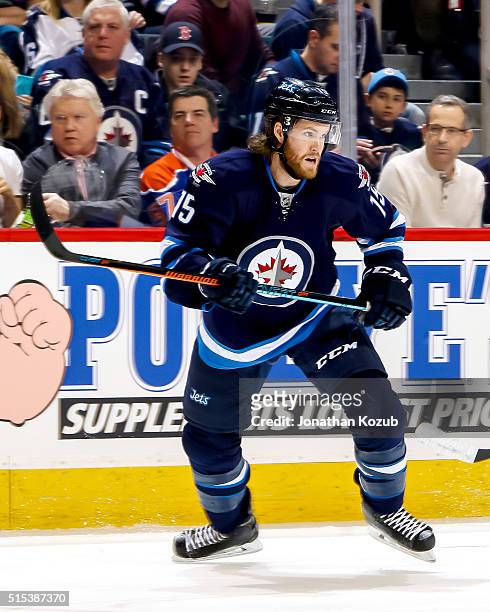 Matt Halischuk of the Winnipeg Jets keeps an eye on the play during first period action against the Edmonton Oilers at the MTS Centre on March 6,...