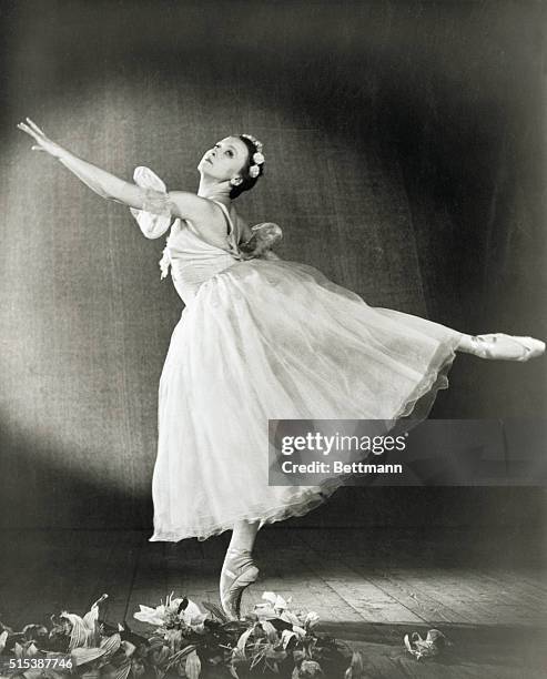 Prima ballerina Galina Ulanova , the supreme example of the Soviet school of ballet, standing en pointe in a production by the Bolshoi Ballet, ca....