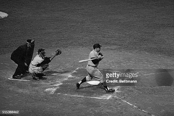 Lawrence Berra, of the New York Yankees, gets a single in the 4th inning of game against Los Angeles Angels and became the first catcher in major...