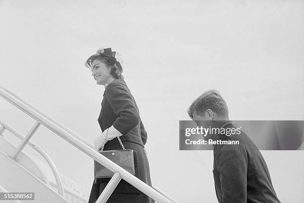 Kennedy's leaving. Andrews Air Force Base, MD.: President and Mrs. Kennedy as they approach the 707 government jet transport today that will take...