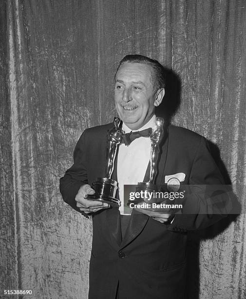 Winning Oscars is no new experience for Walt Disney, who copped two of them at the RKO Pantages Theatre during the Academy Awards. He is shown...