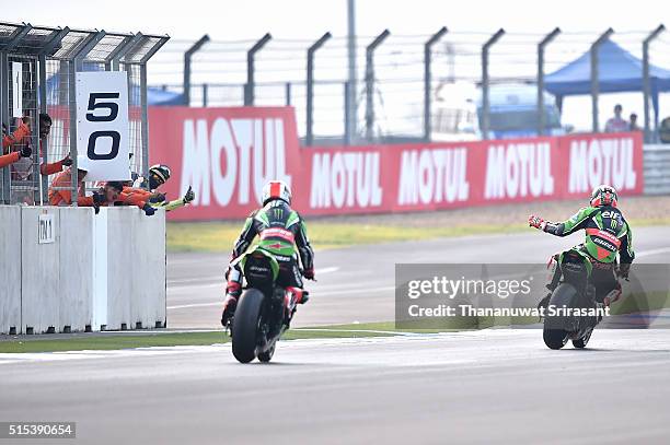 Tom Sykes and Jonathan Rea of Great Britain competes during the Buriram World Superbike Championship on March 13, 2016 in Buri Ram, Thailand.